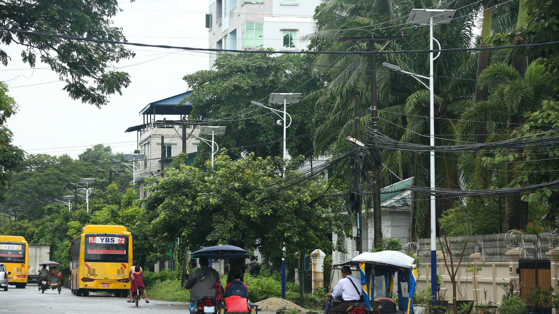 YANGON, July 24, 2025 -- This photo taken on July 24, 2025 shows solar-powered streetlights along the street in Yangon, Myanmar. A donation ceremony for China-aided solar-powered streetlights was held in Yangon on Thursday. At the event, 40 solar streetlights, provided by the Yunnan Provincial People's Association for Friendship with Foreign Countries, were handed over to the chairman of the Thaketa township administration body. The donation aimed to improve night travel safety and red...