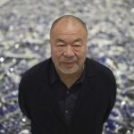 Dissident Chinese artist and activist Ai Weiwei poses for a photograph at his exhibition "Making Sense" at the Design Museum, in London, Tuesday, April 4, 2023. 