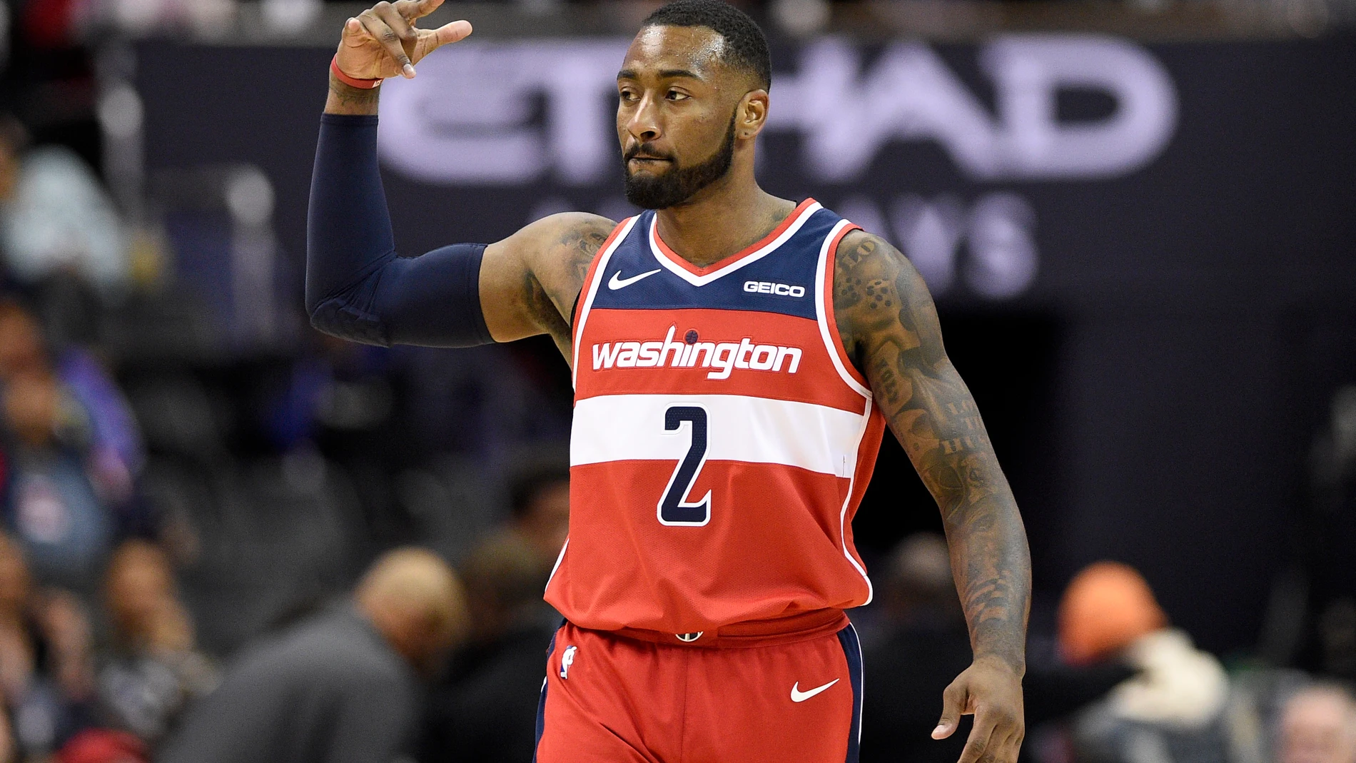 FILE - Washington Wizards guard John Wall gestures after hitting a 3-point basket during the second half of the team's NBA basketball game against the Brooklyn Nets, Saturday, Dec. 1, 2018, in Washington. (AP Photo/Nick Wass, File)