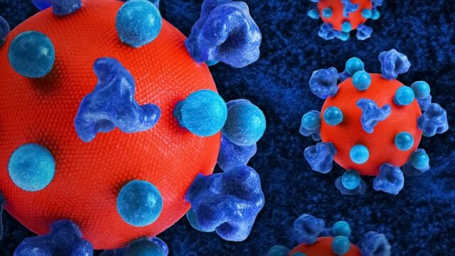 Virus del VIH (en rojo) con proteínas en azul que le permiten la entrada en las células