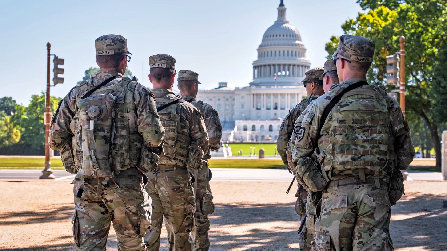 Armed National Guard soldiers from West Virginia patrol the Mall near the Capitol in Washington, as part of President Donald Trump's order to impose federal law enforcement in the District of Columbia, Tuesday, Aug. 26, 2025. (AP Photo/J. Scott Applewhite)