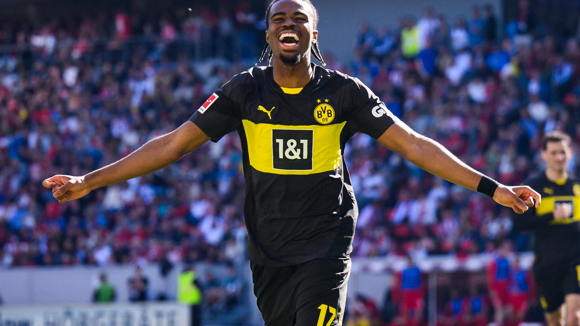 FILE - Dortmund's Carney Chukwuemeka celebrates after scoring during the German Bundesliga soccer match between SC Freiburg and Borussia Dortmund, at the Europa-Park Stadium in Freiburg im Breisgau, Germany, Saturday, April 5, 2025. (Tom Weller/dpa via AP, File)