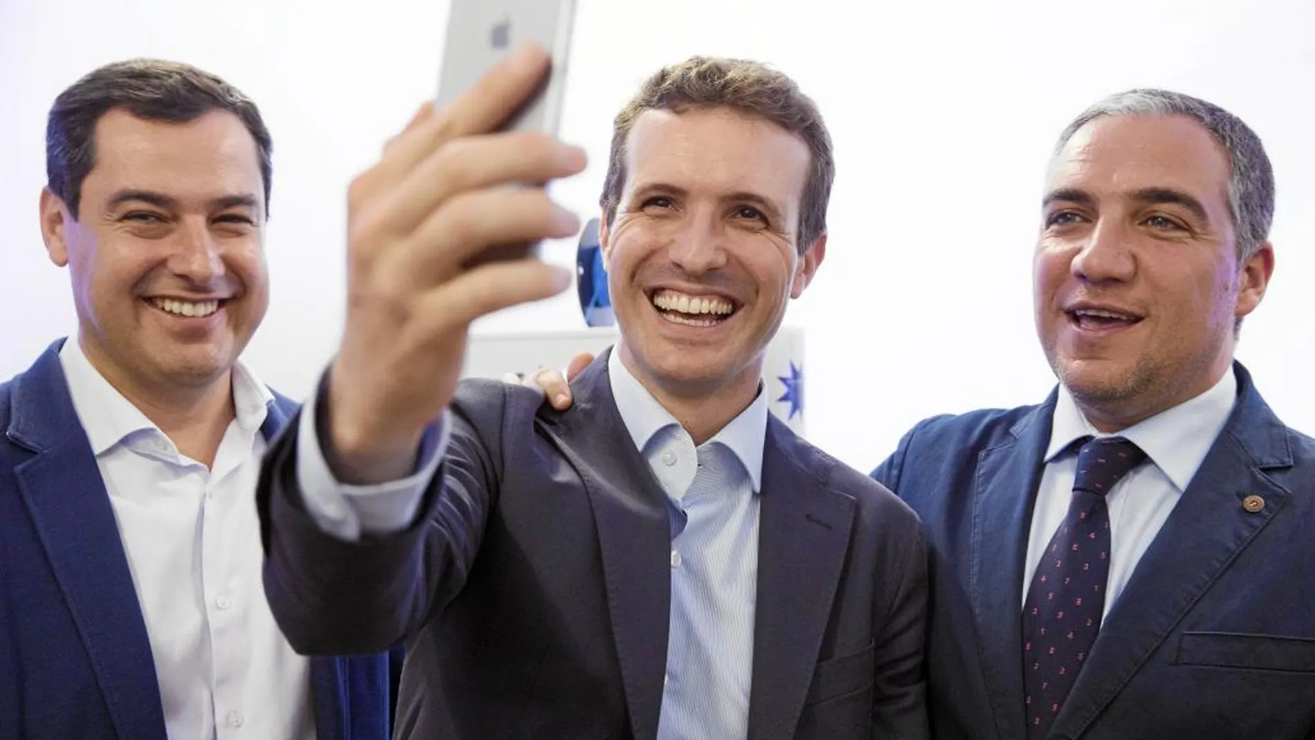 Juanma Moreno, Pablo Casado y Elías Bendodo, ayer en Málaga