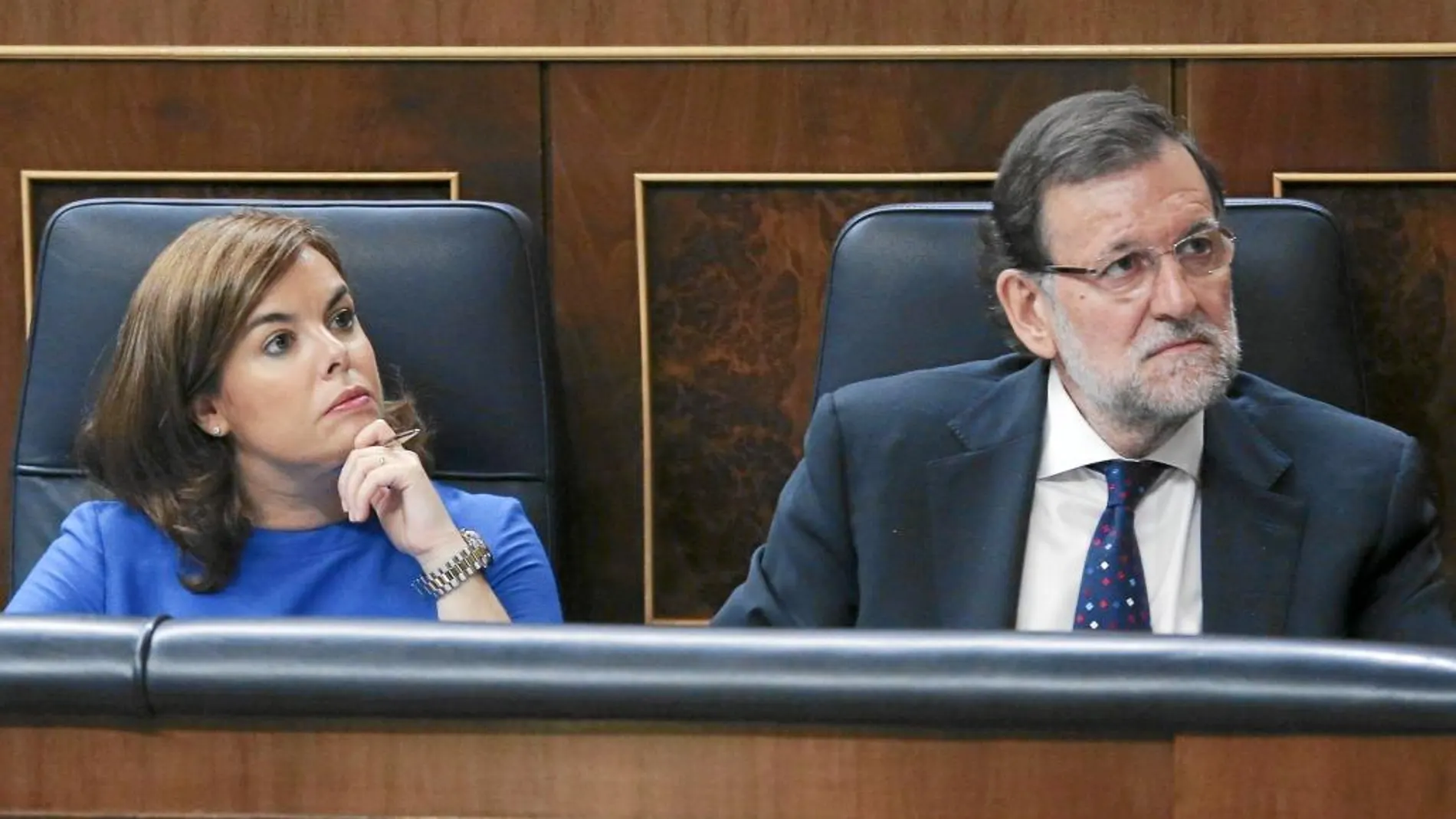 El presidente del Gobierno, Mariano Rajoy, ayer junto a la vicepresidenta Sáenz de Santamaría