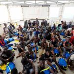 Varios inmigrantes rescatados a bordo del barco Aquarius en el Mediterráneo el 10 de agosto del 2018 .EFE/ Guglielmo Mangiapane/SOS MEDITERRÁNEÉ