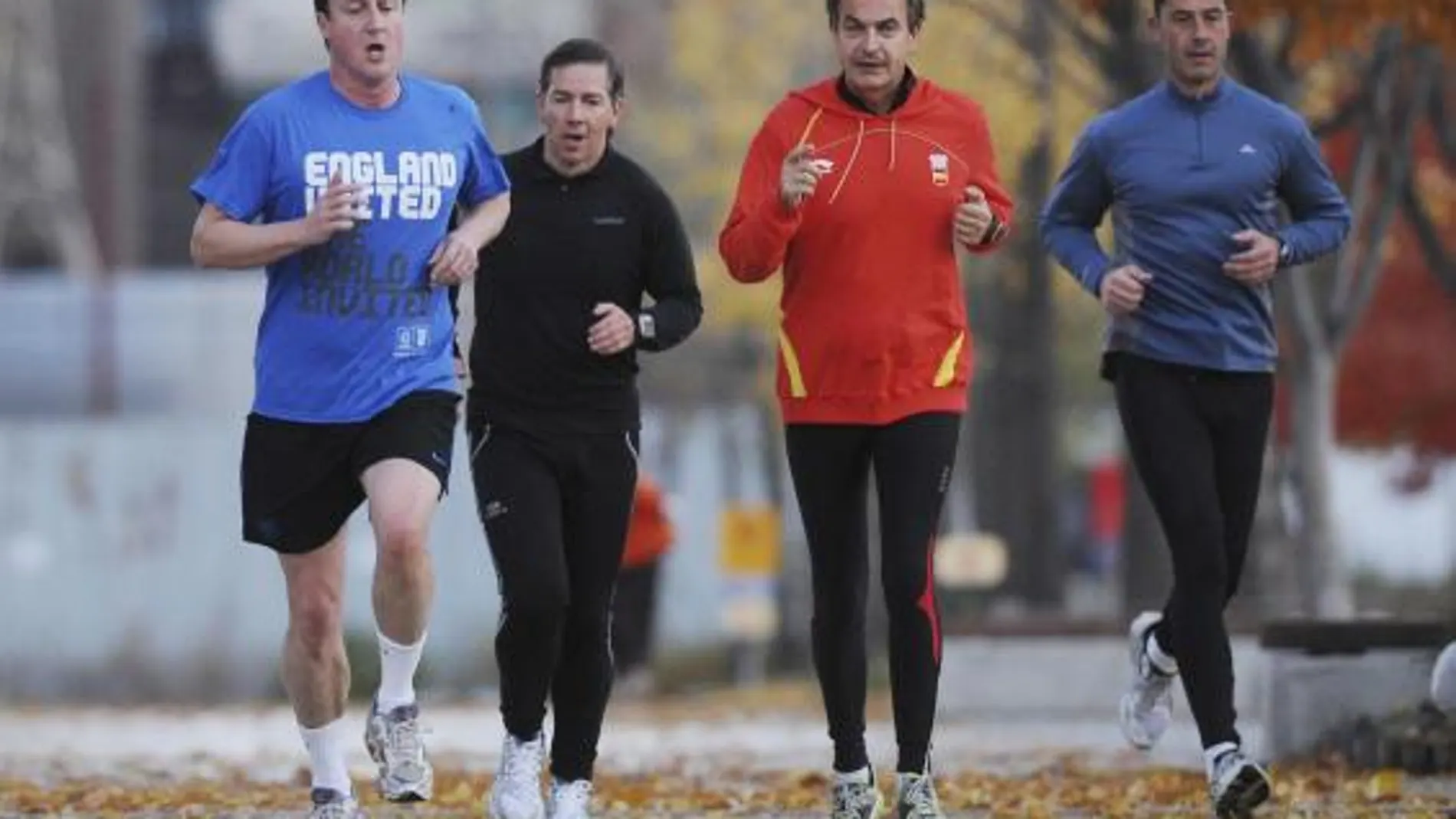 Zapatero y Cameron corriendo esta mañana en Seúl