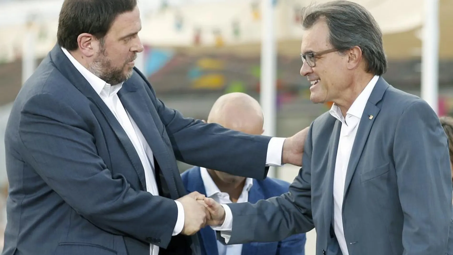 Los presidentes de CDC, Artur Mas, y de ERC, Oriol Junqueras, dos de los partidos con irregularidades.