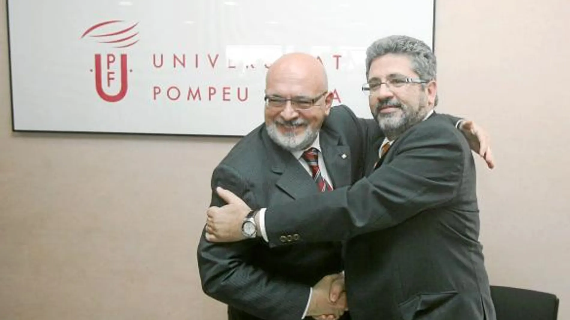 Imagen del conseller Huguet y el rector de la Universidad Pompeu Fabra, Josep Joan Moreso