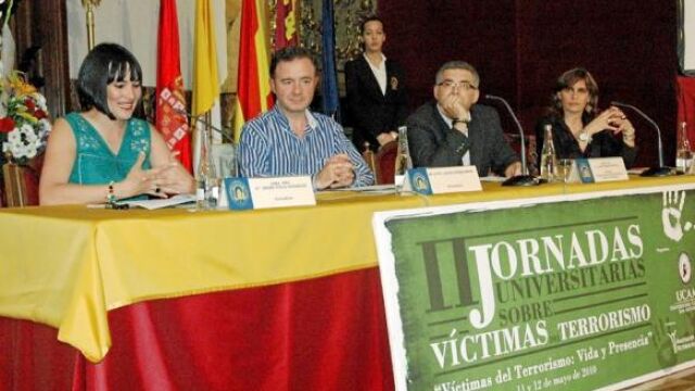 Villa, Jiménez, Frutos y Couceiro, durante la celebración de las jornadas en la Católica