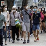 Ciudadanos con mascarillas en Seul
