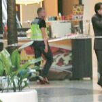 Asalto a tiros en un centro comercial