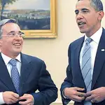  Obama aconseja a Uribe que deje el poder y no busque la reelección