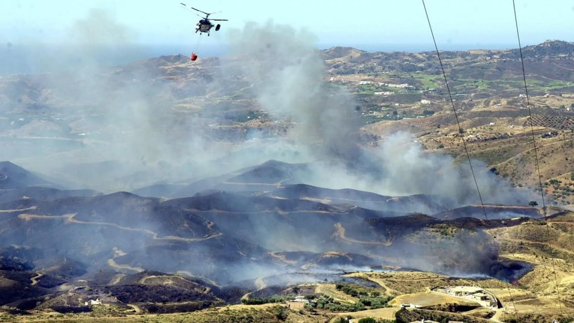 Pillada infraganti la presunta autora de siete incendios en Málaga