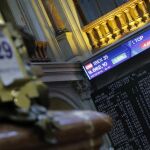 Panel del Ibex 35 en la Bolsa de Madrid, hoy, 29 de diciembre.