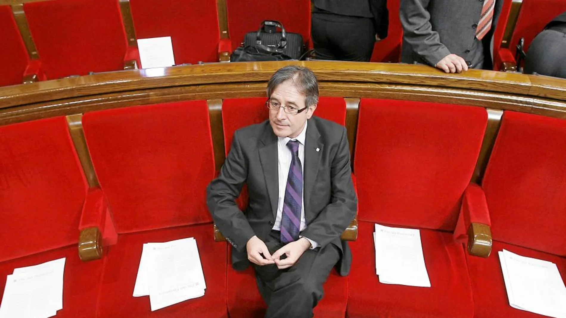 El ex consejero de Gobernación, Jordi Ausàs, durante una sesión del Parlament en 2012