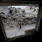 Imagen de un edificio dañado por los combates en Siria.