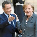 Nicolas Sarkozy y Angela Merkel dieron un puñetazo encima de la mesa para imponer los recortes al resto de los estados miembros