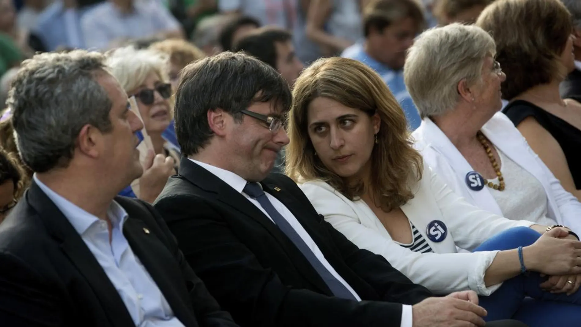 El expresidente de la Generalitat, Carles Puigdemont y Marta Pascal en una imagen de archivo.