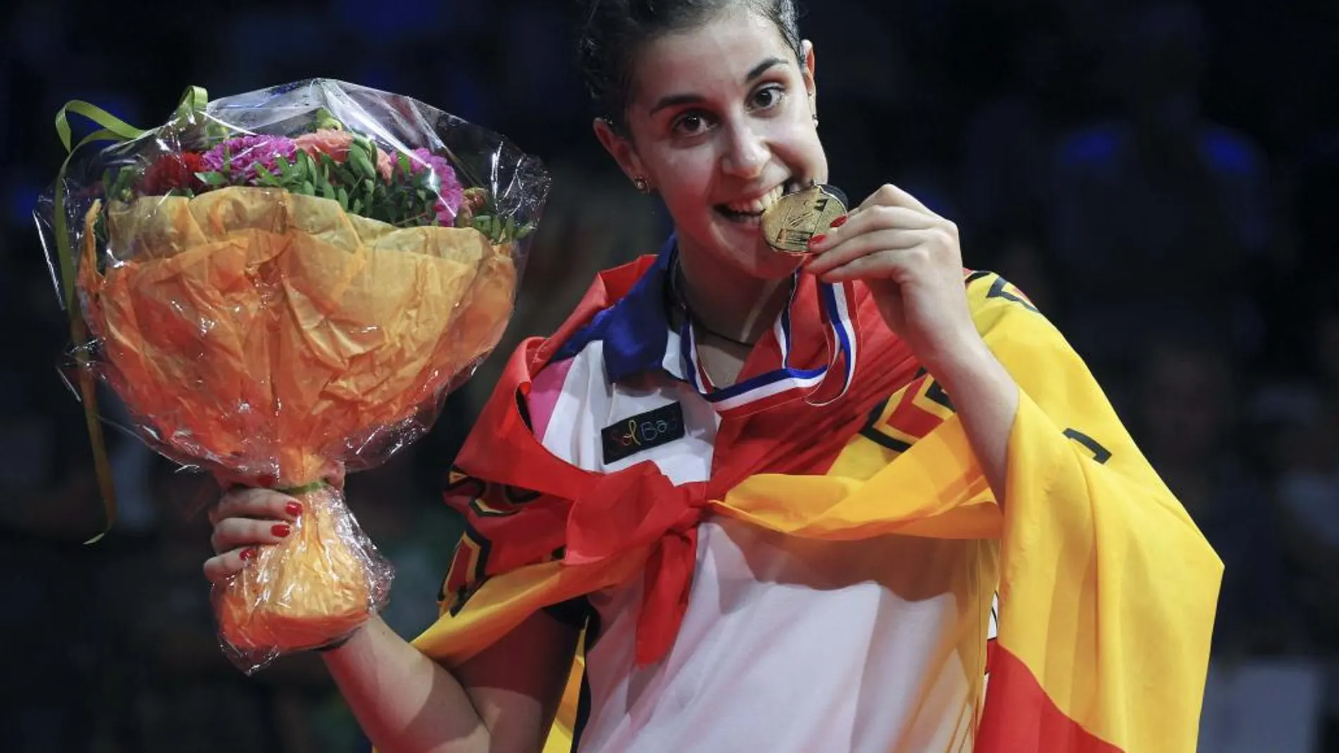 Fotografía facilitada por Badmintonphoto de la española Carolina Marín tras conseguir el oro histórico para el bádminton nacional, en agosto de 2014