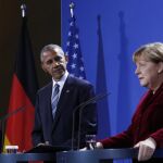 La canciller alemana, Ángela Merkel, junto al presidente de EE UU, Obama, ayer en Berlín, durante la rueda de prensa conjunta