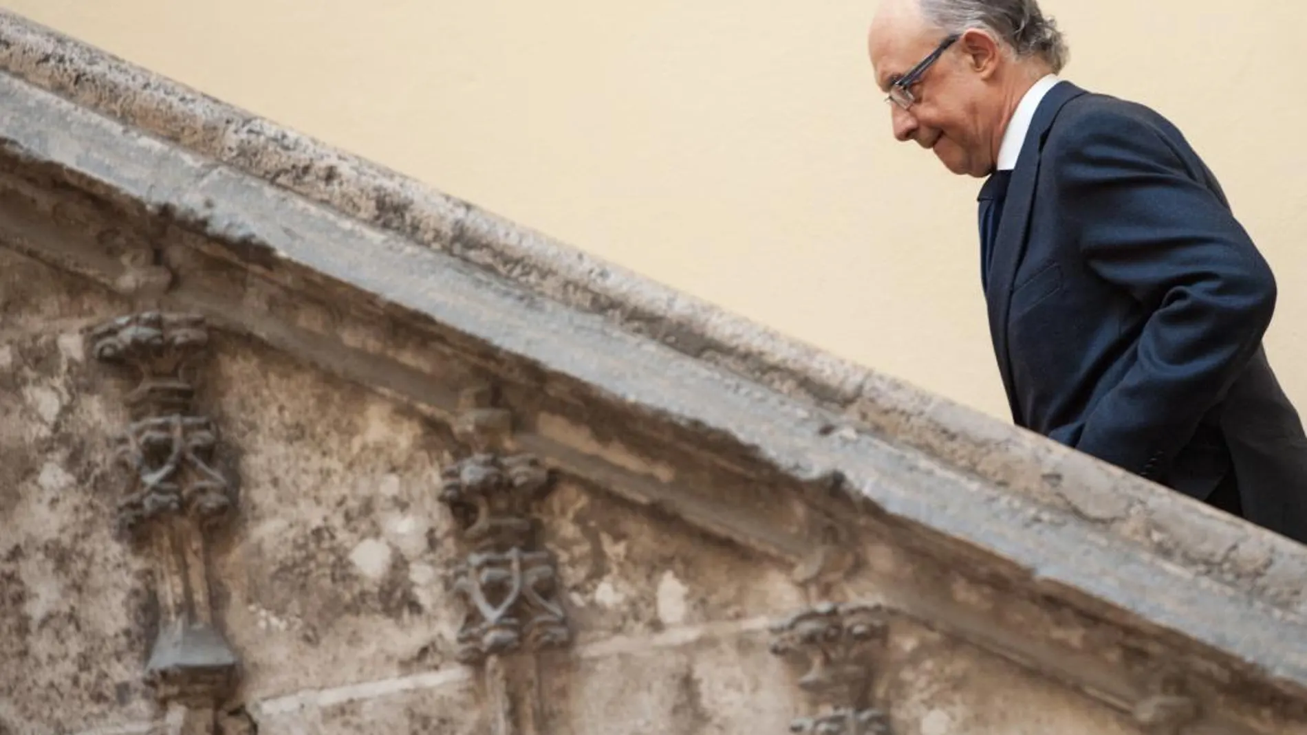 El ministro de Hacienda, Cristóbal Montoro, durante su visita al Palau de la Generalitat en enero del año pasado