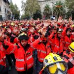 Los bomberos el día de la huega/Reuters