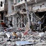 Edificios dañados tras un ataque en la ciudad de Homs el pasado día 21 de febrero