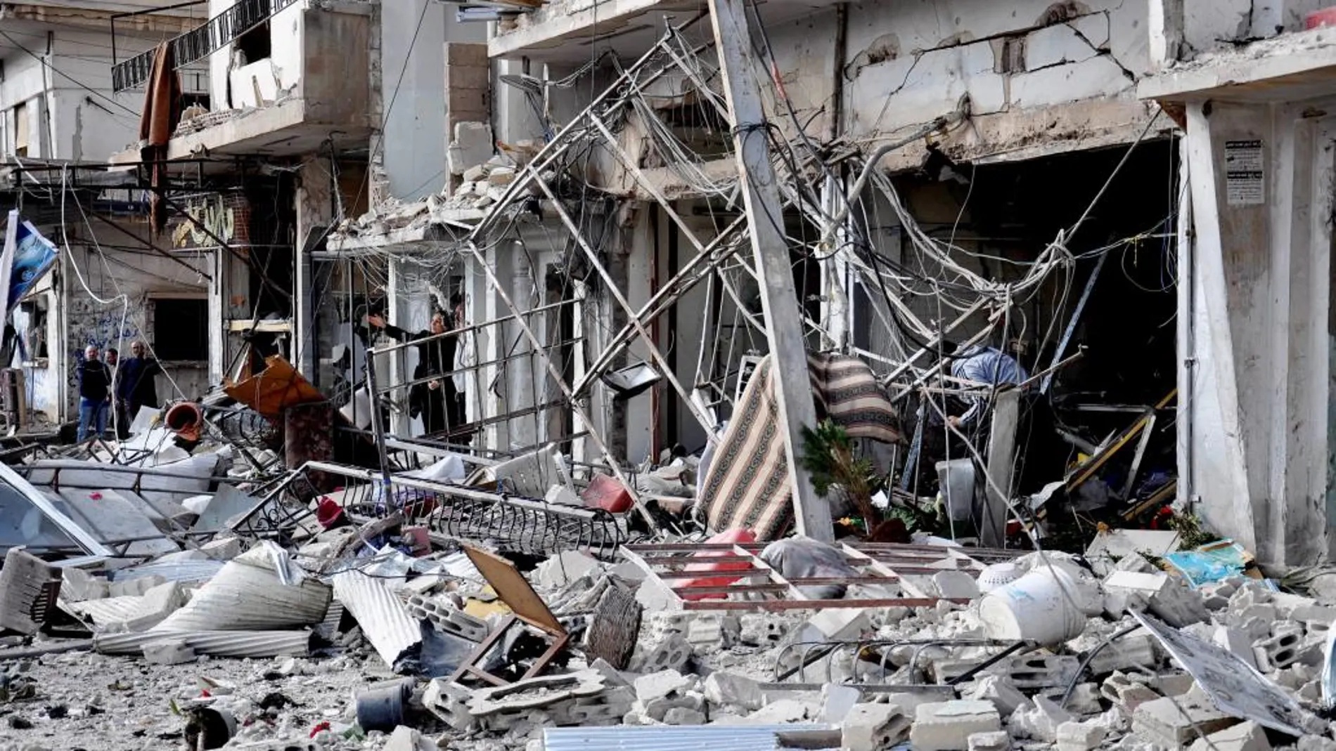 Edificios dañados tras un ataque en la ciudad de Homs el pasado día 21 de febrero