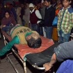 Imagen del rescate de cuerpos en Patna, India