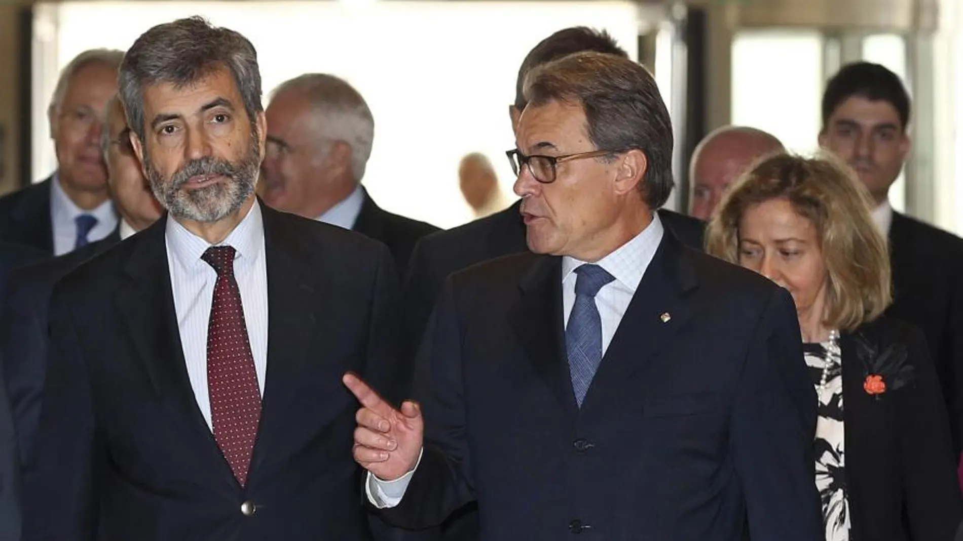 El presidente de la Generalitat, Artur Mas (i), junto al presidente del Tribunal Supremo, Carlos Lesmes (d), a su llegada al acto de inauguración de la 58 reunión anual de la Unión Internacional de Magistrados