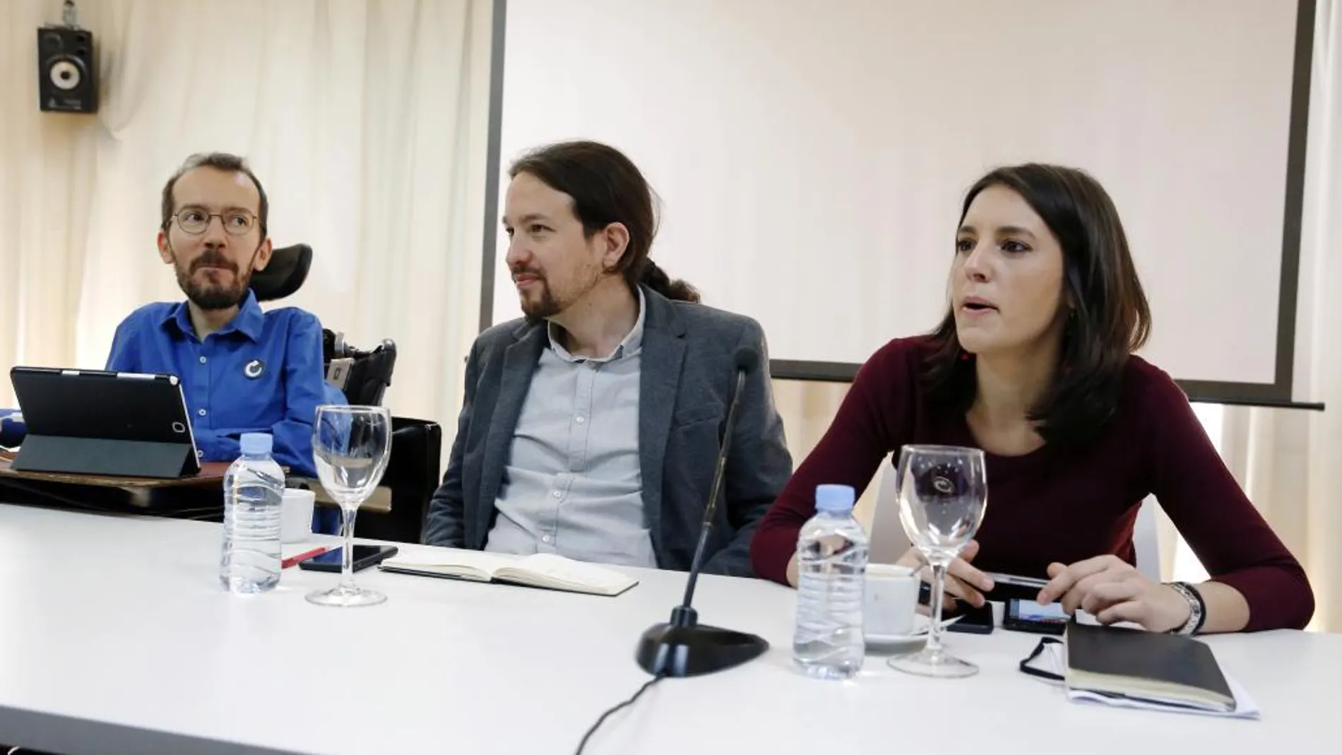 Los líderes de Podemos, Pablo Iglesias (c), Pablo Echenique e Irene Montero.