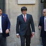El presidente catalán Carles Puigdemont con Oriol Junqueras y Jordi Turull
