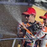 Marc Marquez y Dani Pedrosa, en el podio