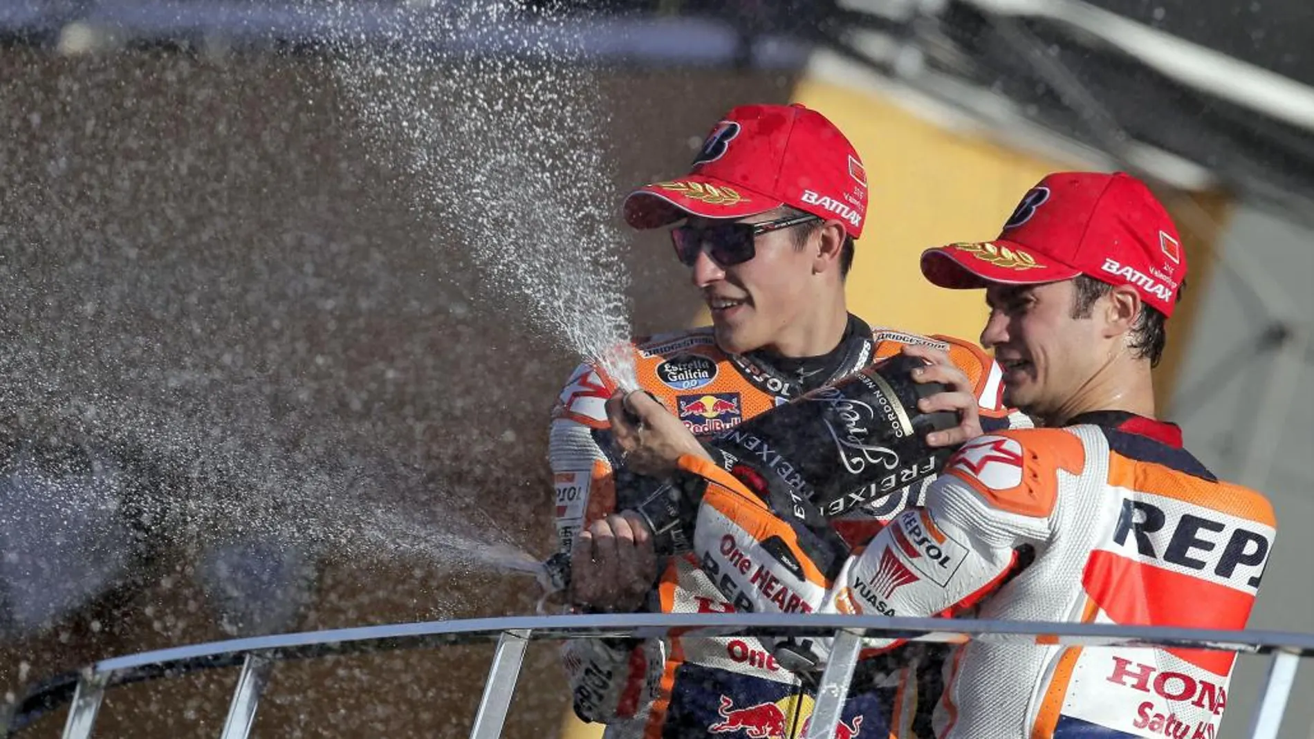 Marc Marquez y Dani Pedrosa, en el podio