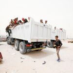 Un grupo de refugiados procedente de Faluya llega al campo de Ameriyat huyendo del Estado Islámico