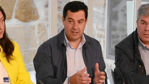 Loles López, Juanma Moreno y José Enrique Fernández de Moya