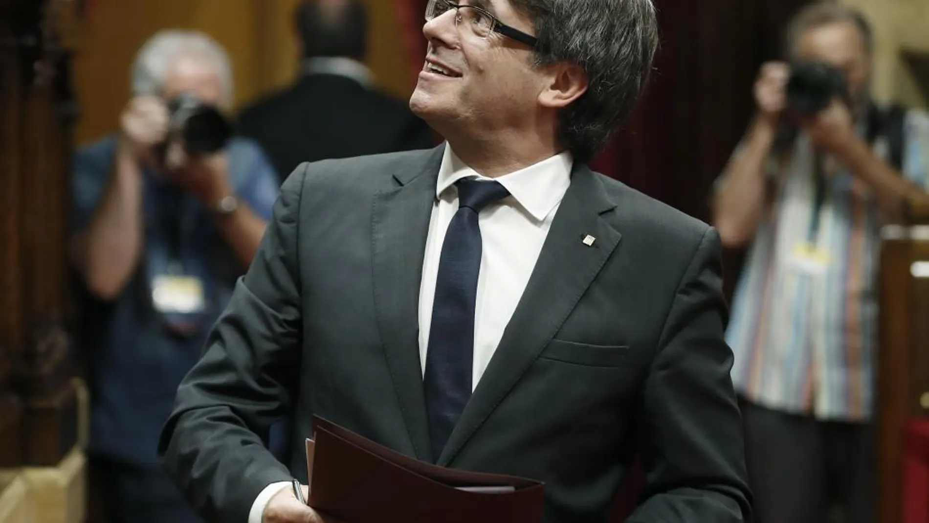 El presidente de la Generalitat, Carles Puigdemont, durante la segunda jornada del pleno del Parlament