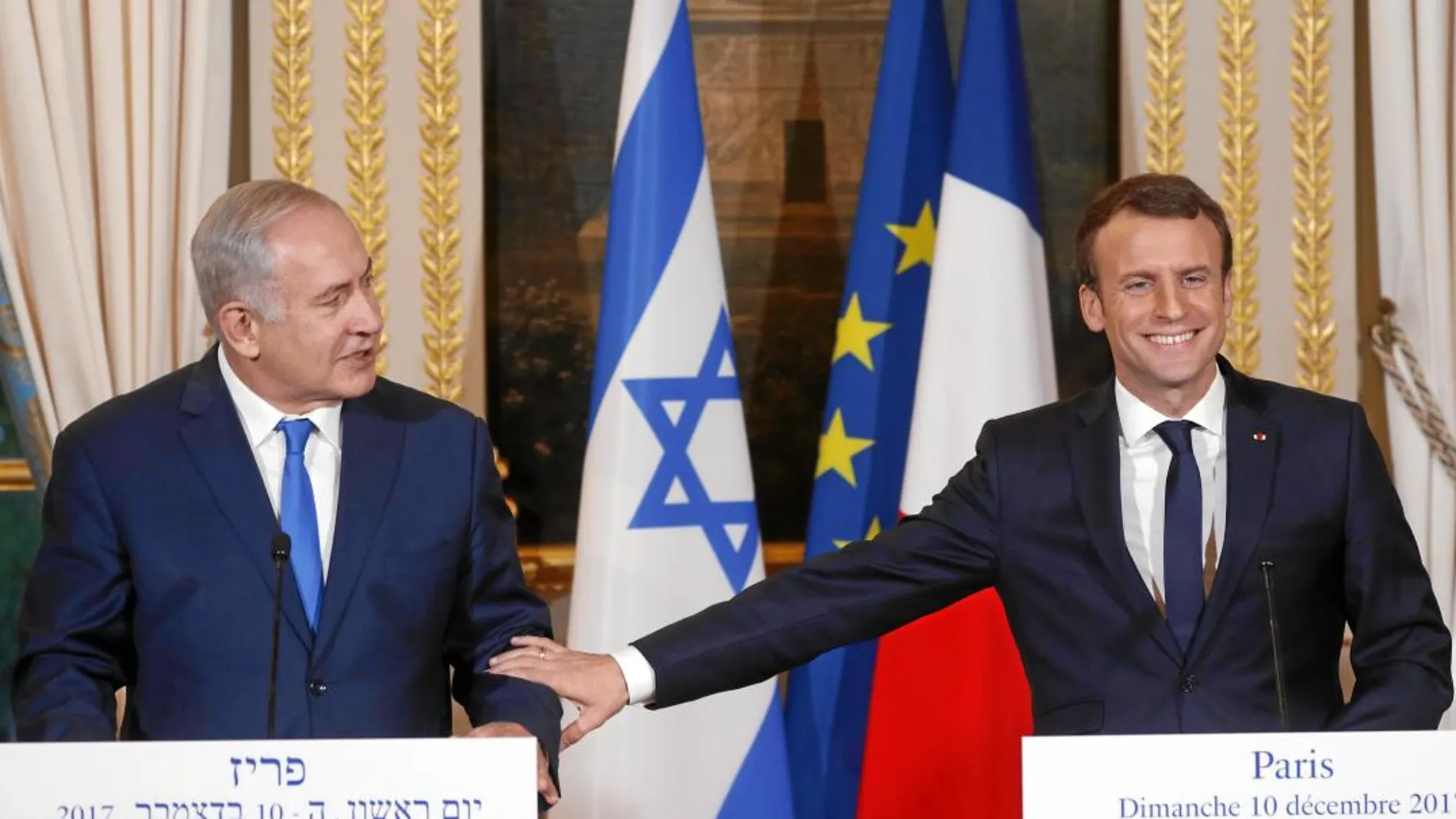 El presidente francés, Emmanuel Macron, ayer, junto al primer ministro israelí, Benjamin Netanyahu