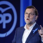 El líder del PP y presidente del Gobierno en funciones, Mariano Rajoy, durante su intervención en la Convención del PP