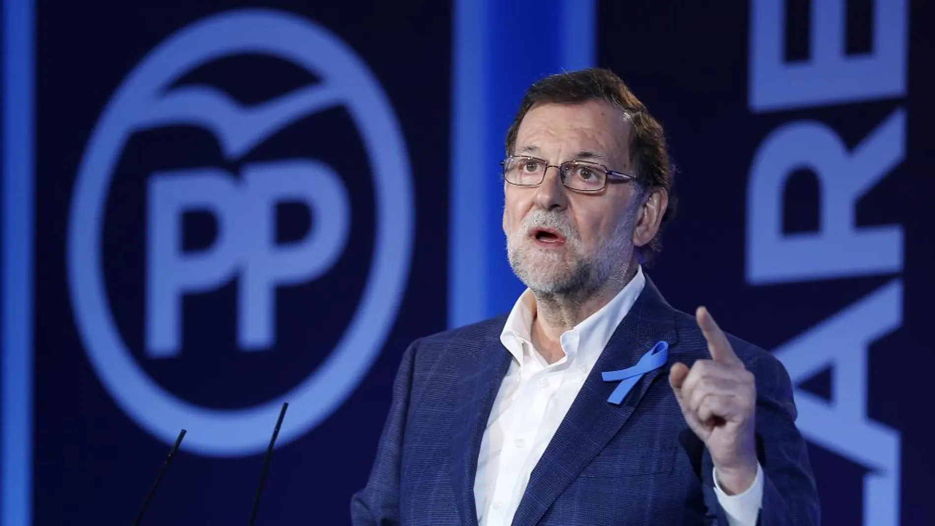 El líder del PP y presidente del Gobierno en funciones, Mariano Rajoy, durante su intervención en la Convención del PP