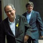 El actual president de la Generalitat, Quim Torra, junto con su antecesor, Carles Puidgemont