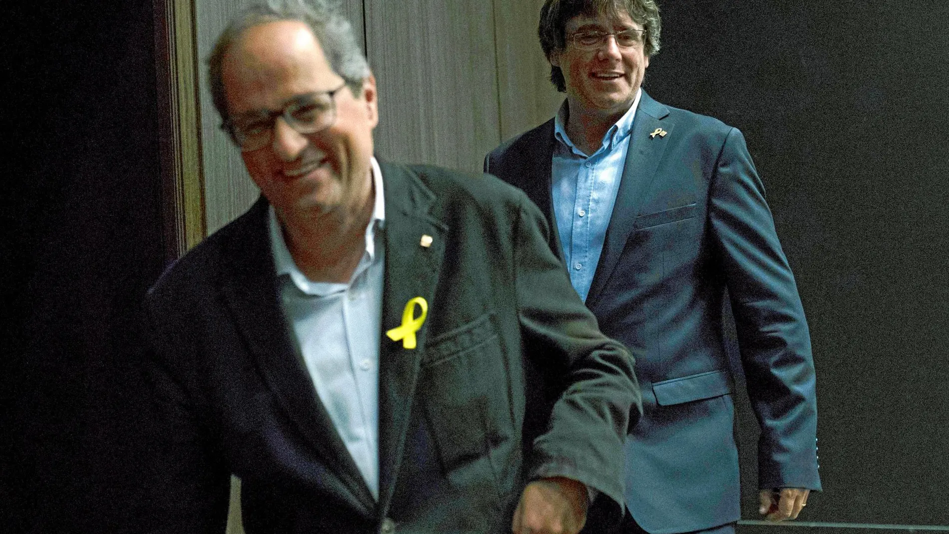El actual president de la Generalitat, Quim Torra, junto con su antecesor, Carles Puidgemont