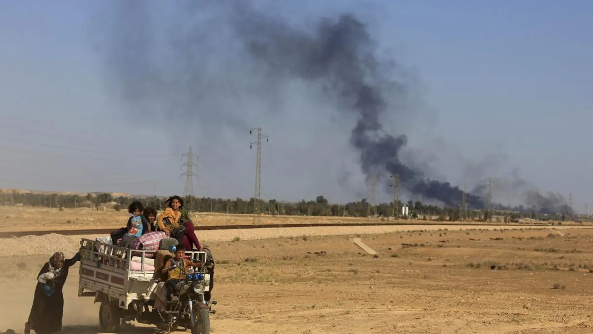 Una familiahuye de Mosul