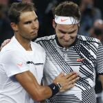 Roger Federer y Nadal tras la victoria del suizo