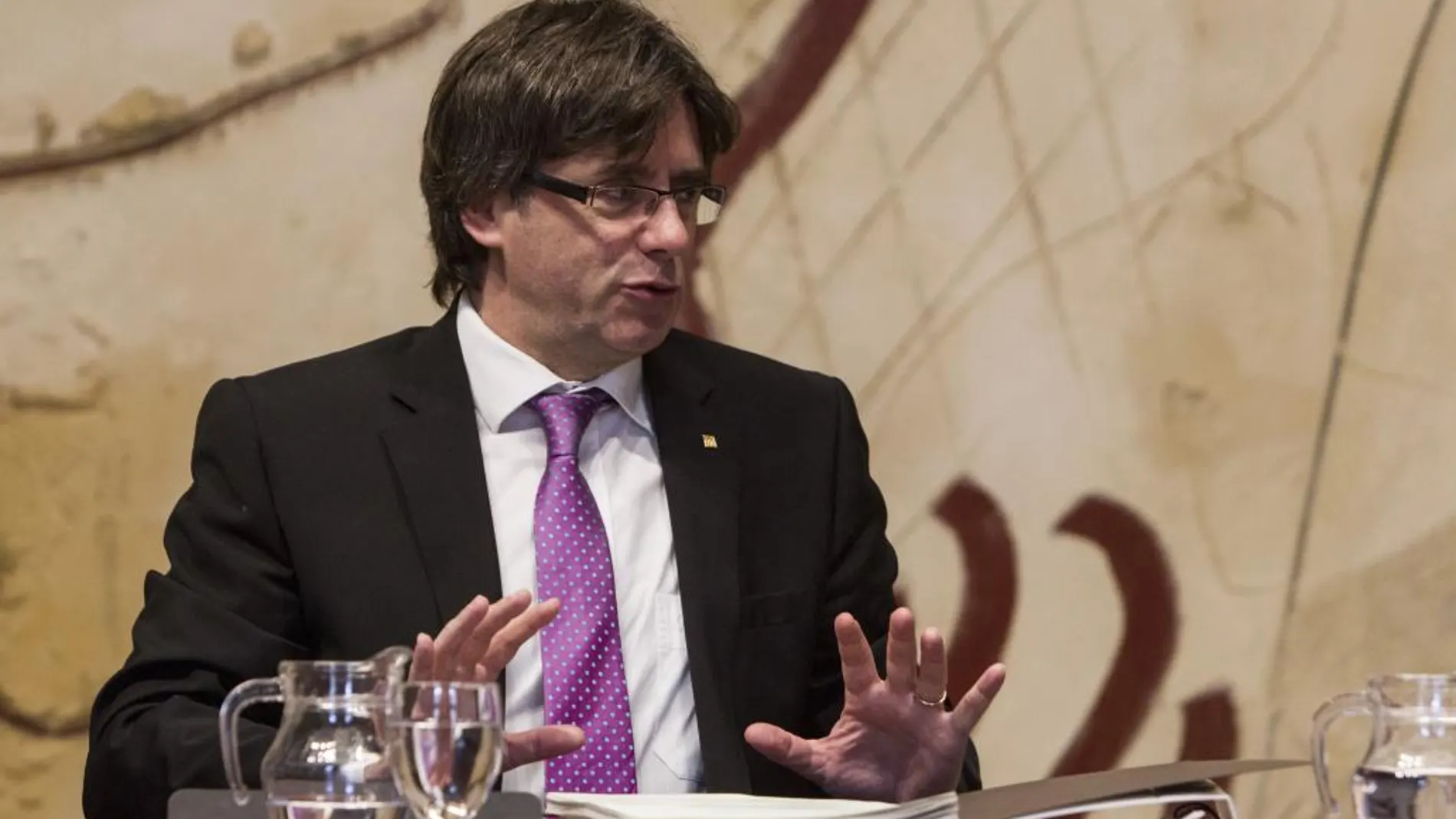 El presidente de la Generalitat de Cataluña, Carles Puigdemont, durante la reunión semanal del gobierno catalán, el pasado día 23