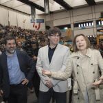 Carles Puigdemont, Carme Forcadell y Jordi Sánchez, durante la quinta asamblea general ordinaria de la ANC