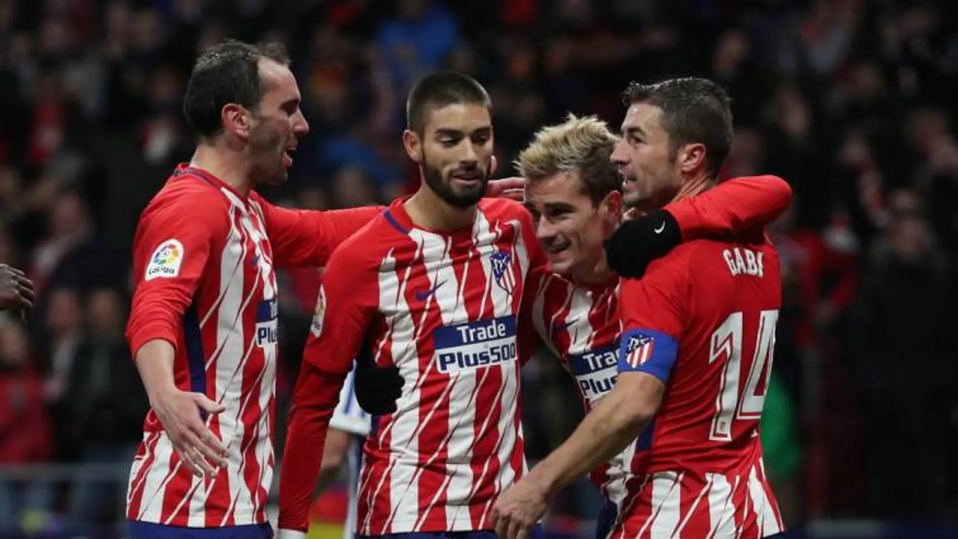 Los jugadores del Atlético celebran un gol de Griezmann