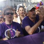 Cientos de personas participan en la Puerta del Sol de Madrid en la concentración convocada por Podemos