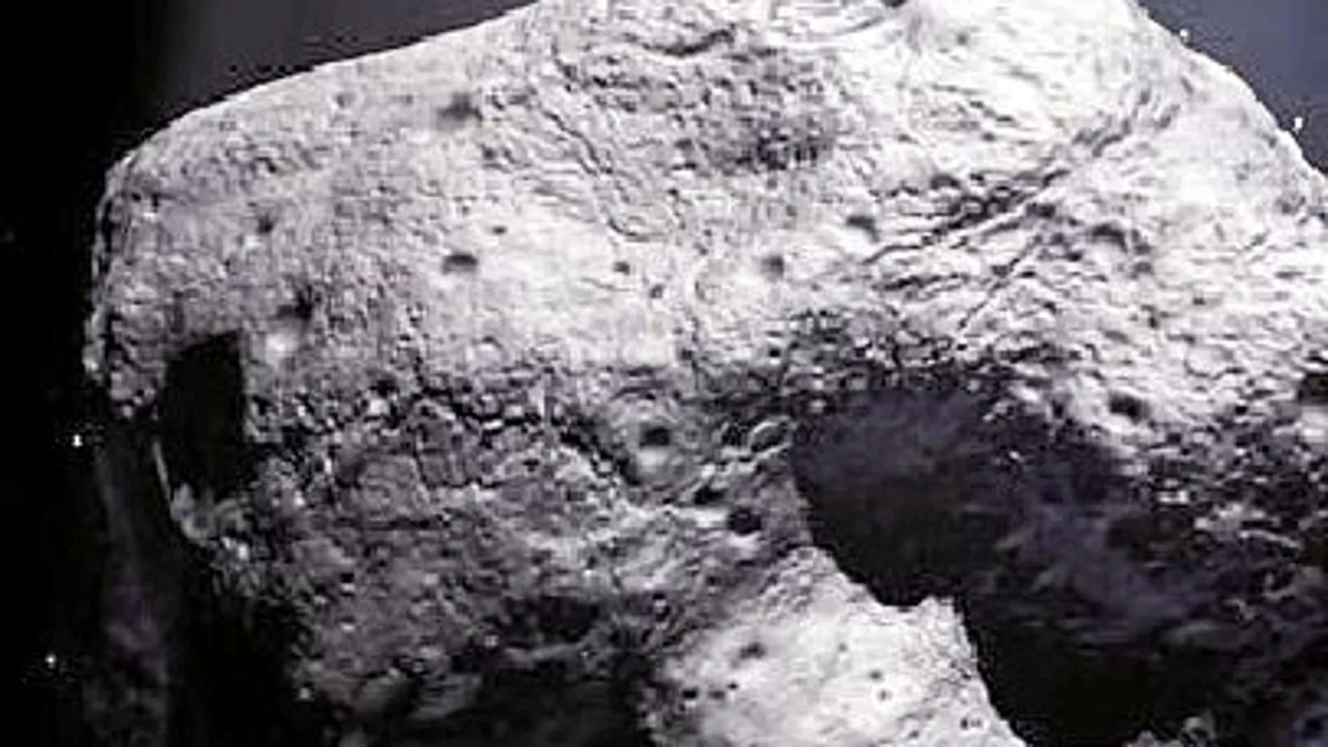 Una recreación de la NASA del asteroide 2013TX68 que se acercará en marzo a la Tierra.