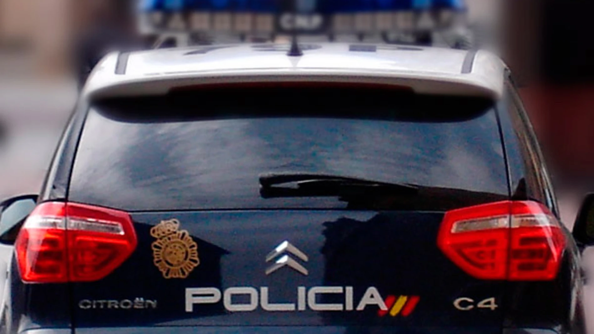 Imagen de un coche de la Policía Nacional en Paterna